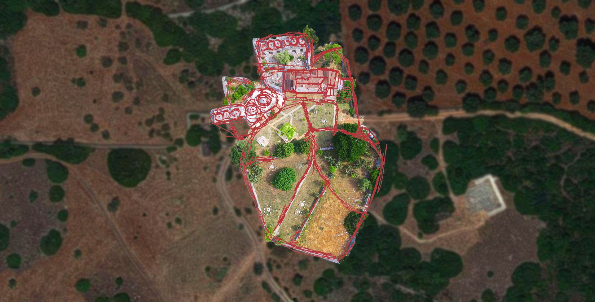 The masseria logo on the courtyard